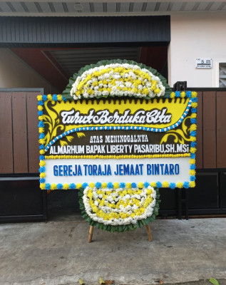 Papan Bunga Duka di Utan Panjang